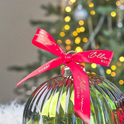 red ribbon and green bauble