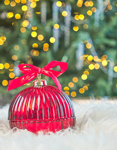 red bauble with red ribbon